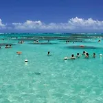 Neo em Frente a Praia Pajuçara
