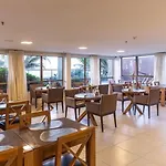 Flat No Ritz Suites Hotel