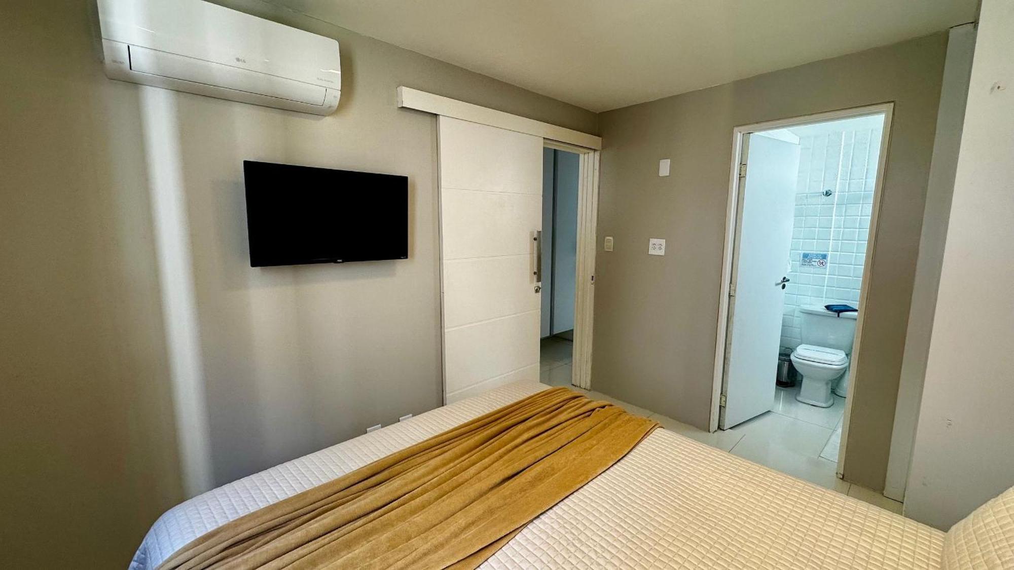 Sevilha Suites: Beachfront Comfort In Ponta Apartment